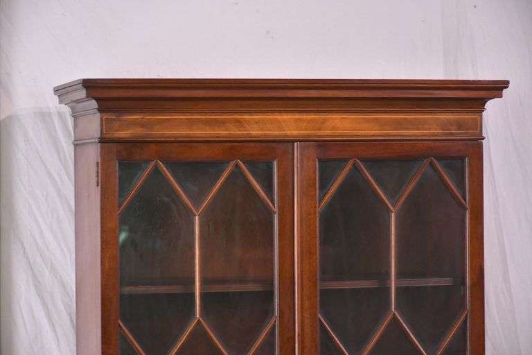 Inlaid crotch mahogany china cabinet; 74-12774
