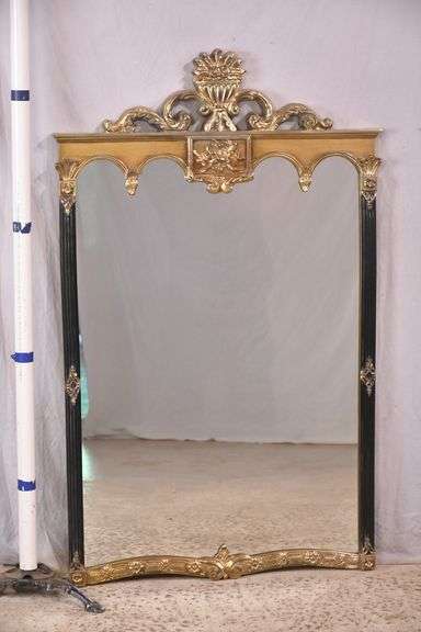 Carolina Mirror Co. large mirror with ornate black and gold frame; 1116-720