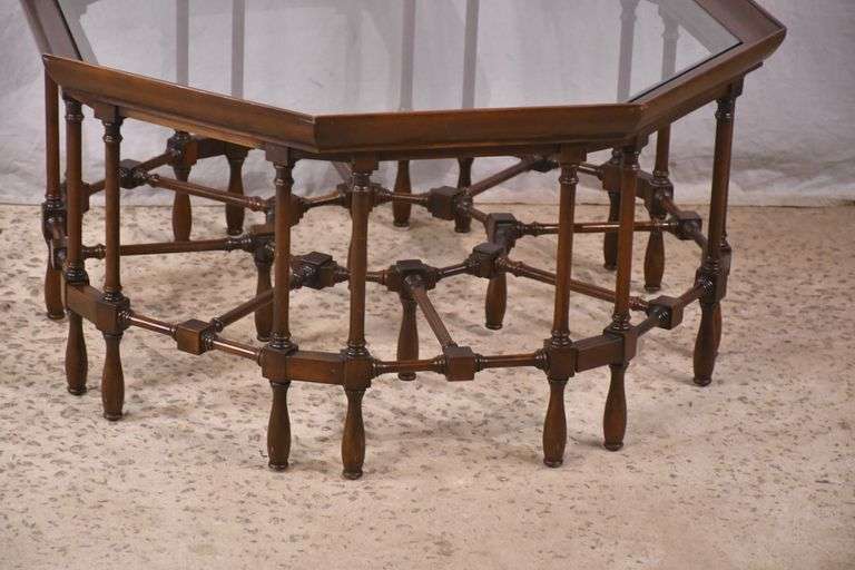 Mahogany octagonal glass top coffee table with cane-cut legs and stretchers; 68-6514
