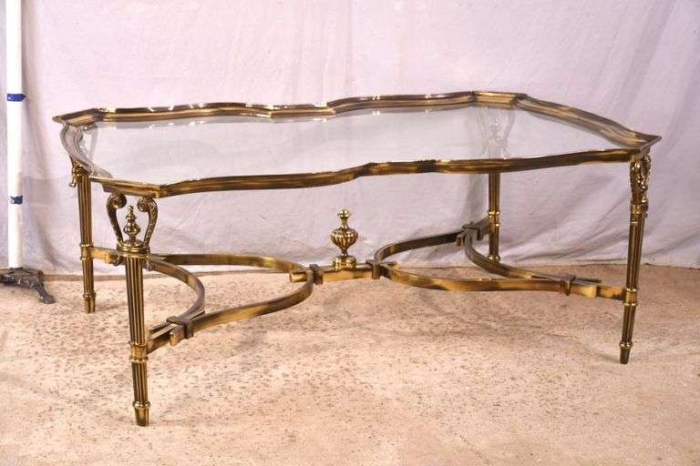 Large gold metal coffee table with glass top; 68-6890