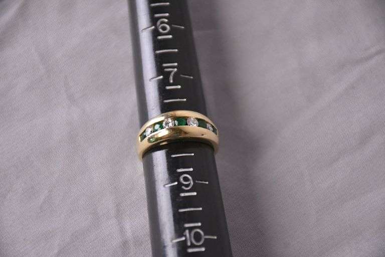 14kt gold ring with channel set emeralds and diamonds; 13227-003