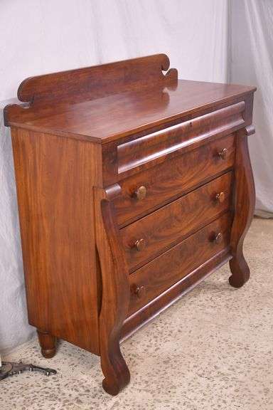 Early crotch mahogany 4 drawer chest with backsplash; 68-6860