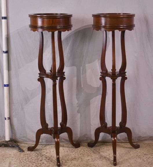 Pair of tall mahogany plant stands; 68-6923