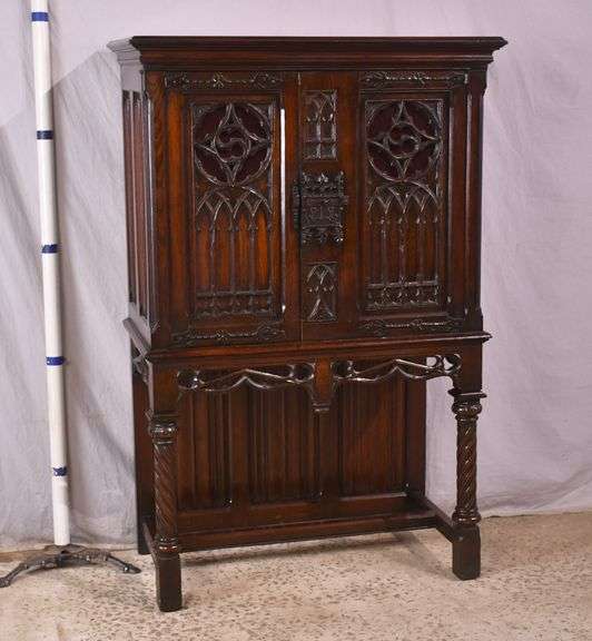 Lightolier carved oak gothic style radio cabinet; 68-6907