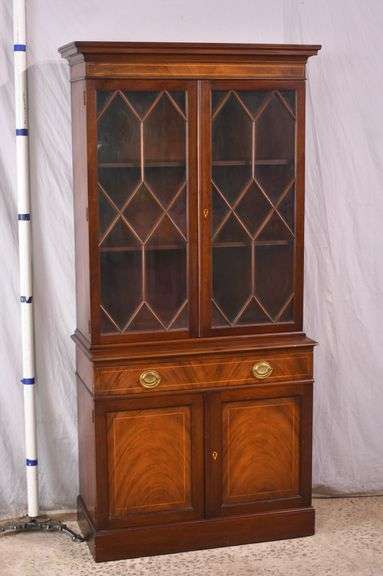Inlaid crotch mahogany china cabinet; 74-12774