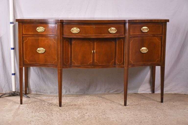 Baker inlaid mahogany serpentine front sideboard; 68-6955