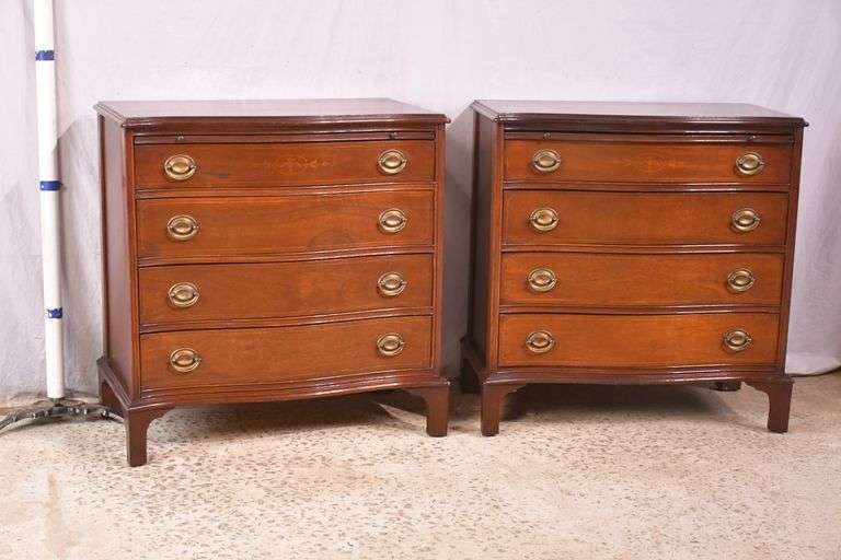 Pair of mahogany serpentine front 4 drawer bachelor's chests with brushing slides; 68-6916