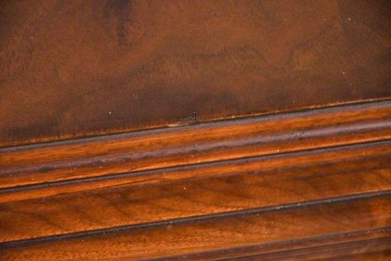 Carved walnut dining table with ornate trestle base; 74-12809D