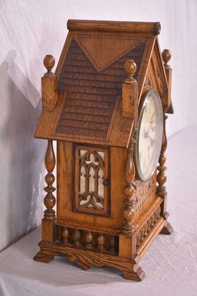 Winterhalder & Hofmeier Victorian era clock with carved oak case; 1086-017