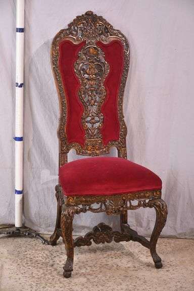 Carved oak high back accent chair with ornate stretcher base; 74-12804