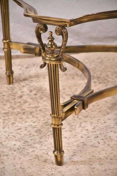 Large gold metal coffee table with glass top; 68-6890
