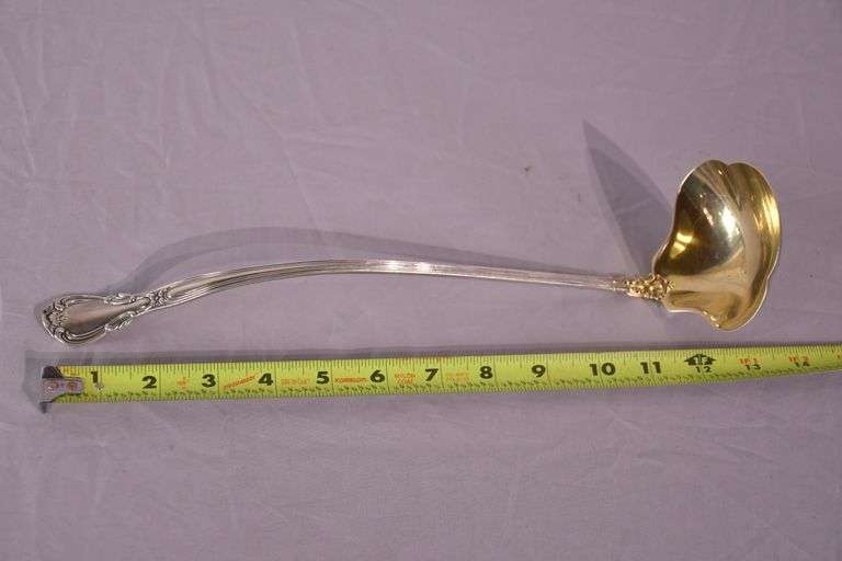 Large sterling silver ladle with gold wash interior; 971-274