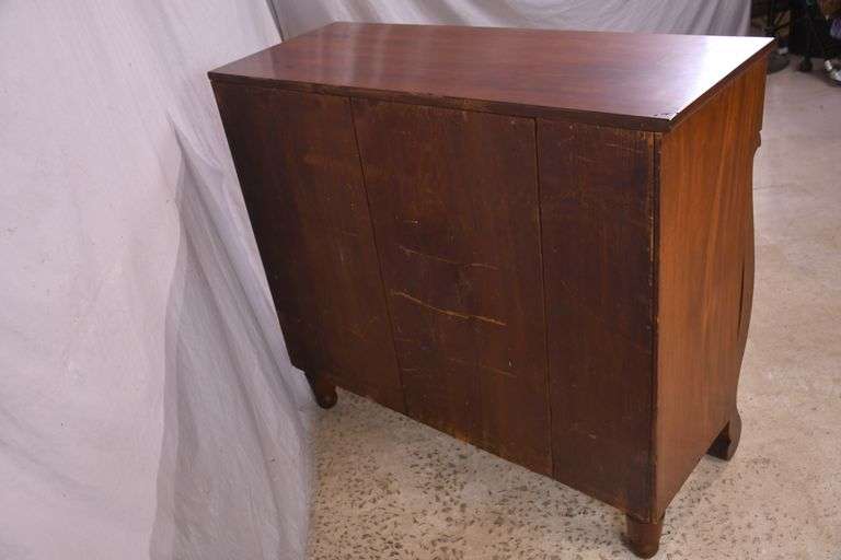 Early crotch mahogany 4 drawer chest with backsplash; 68-6860