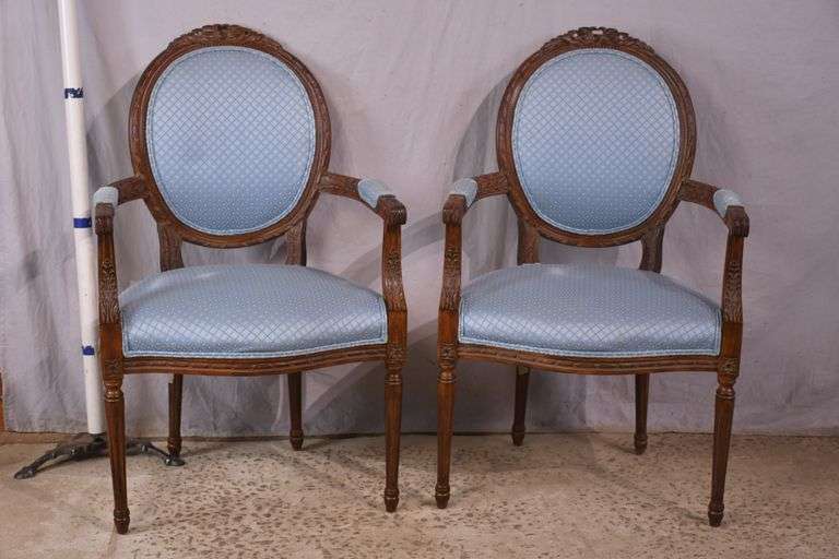 Pair of carved French style open armchairs; 68-6883