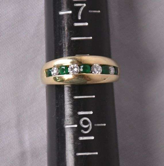 14kt gold ring with channel set emeralds and diamonds; 13227-003