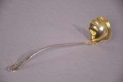 Large sterling silver ladle with gold wash interior; 971-274