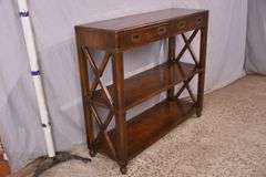 Campaign style three-tier bookcase console with 2 drawers; 68-6908