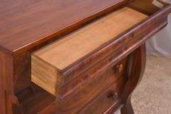 Early crotch mahogany 4 drawer chest with backsplash; 68-6860