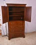 Ethan Allen tall inlaid crotch mahogany gentleman's chest; 68-6897B