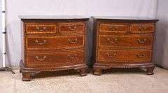 Pair of Universal carved mahogany bowfront bachelor's chests with black marble tops; 68-6869C