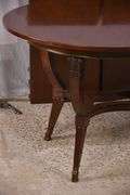Oval mahogany dining table with 2 skirted leaves; 68-6585A