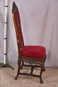 Carved oak high back accent chair with ornate stretcher base; 74-12804