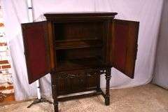 Lightolier carved oak gothic style radio cabinet; 68-6907