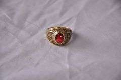 Ladies' 10kt gold Barnwell Highschool 1968 class ring with ruby center stone; 13227-027