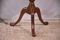 Round mahogany side table with banded top; 68-6846