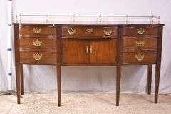 Thomasville cherry serpentine front sideboard with brass rail; 68-6940