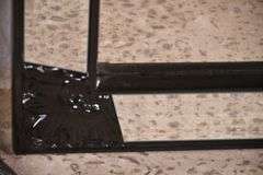 Large beveled mirror with black composite frame and beveled mirror trim; 1044-128