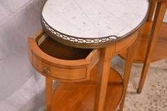 Pair of oval inlaid two-tier single drawer marble top side tables; 68-6885