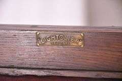 Lightolier carved oak gothic style radio cabinet; 68-6907