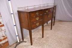 Thomasville cherry serpentine front sideboard with brass rail; 68-6940