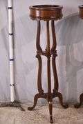 Pair of tall mahogany plant stands; 68-6923