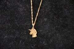 R&B 10kt gold necklace with unicorn head pendant; 13227-020
