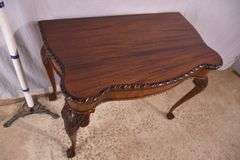 Carved mahogany flip-top table; 74-12753