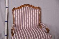 Edward Ferrell Ltd. carved French style open armchair with down cushion; 68-6917