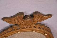 Round porthole mirror with gold eagle frame; 68-6820