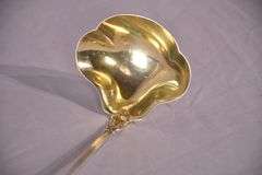 Large sterling silver ladle with gold wash interior; 971-274