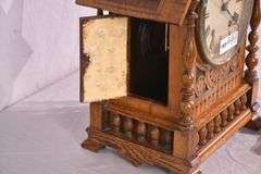 Winterhalder & Hofmeier Victorian era clock with carved oak case; 1086-017