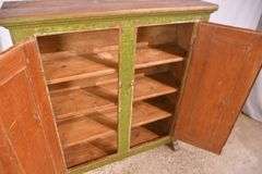 Early green and yellow distressed painted 2 door cupboard; 74-12760
