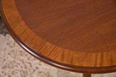Round mahogany side table with banded top; 68-6846