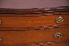 Pair of mahogany serpentine front 4 drawer bachelor's chests with brushing slides; 68-6916