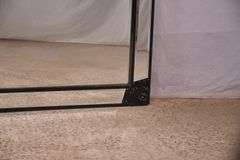 Large beveled mirror with black composite frame and beveled mirror trim; 1044-128