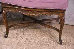 Pair of carved French style open armchairs with cane seats and backs; 68-6922