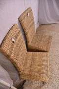 Pair of A & B Home woven dining chairs with distressed finish legs; 579-748B