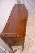 Thomasville cherry serpentine front sideboard with brass rail; 68-6940