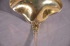 Large sterling silver ladle with gold wash interior; 971-274