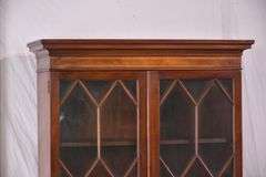 Inlaid crotch mahogany china cabinet; 74-12774